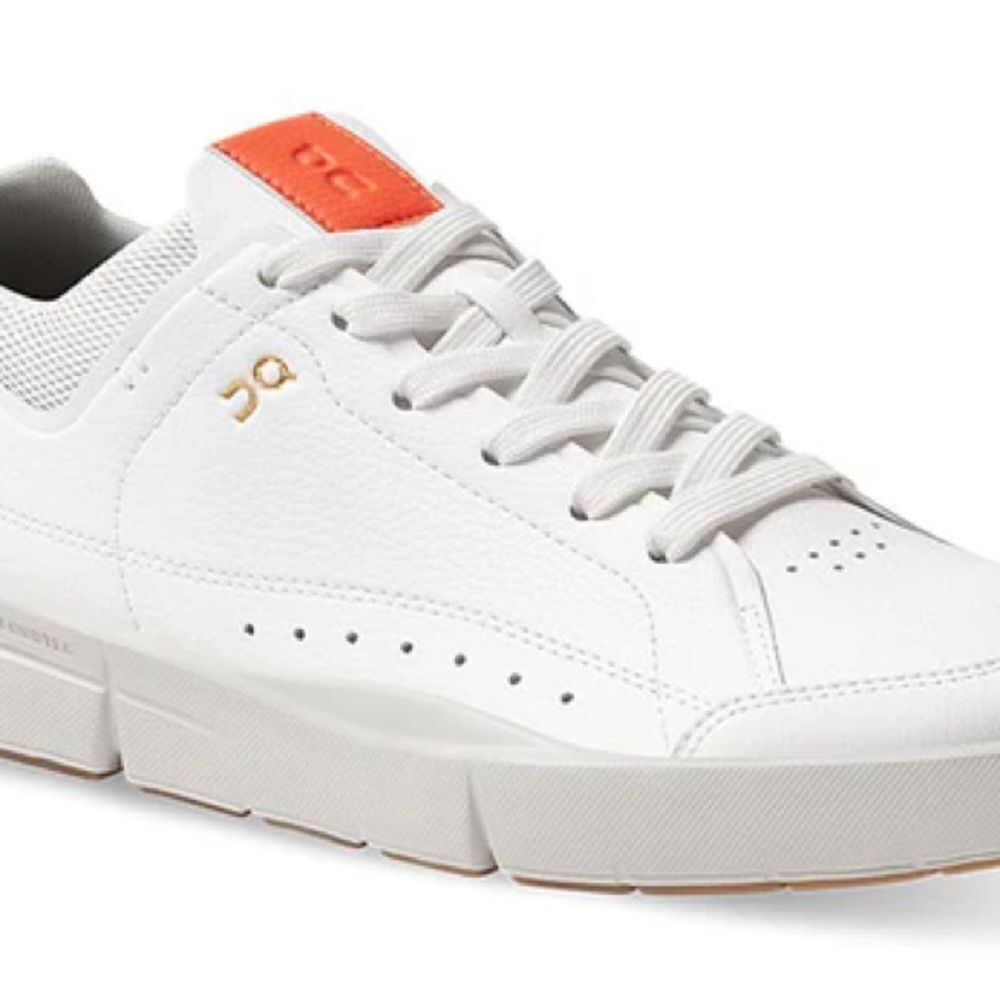 On Running White Sneakers with Orange Accent